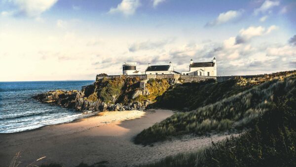 A scenic photograph of a lighthouse in Co. Donegal Ireland - Chauffeur Driven Tours of Ireland