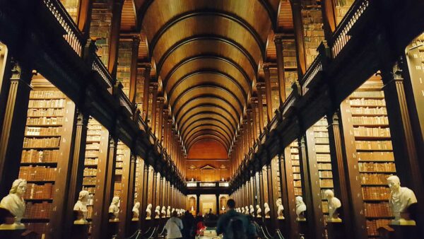 A long angle shot of the Library in Trinity College Dublin, home of the Book of Kells - Chauffeur Driving Tours of Ireland