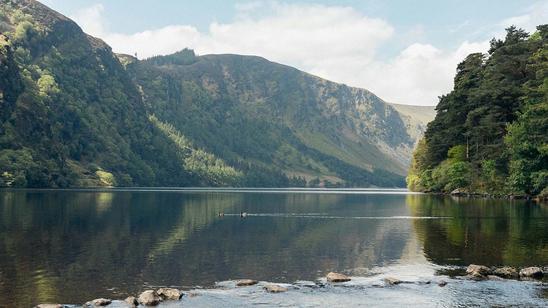 A scenic photo of the lake at Glendalough, Co. Wicklow, Ireland - Chauffeur Driver Tours of Ireland.