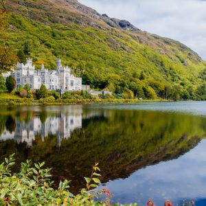 The incredible Kylemore Abbey and lake, included in our 2-day Connemara Lakes and Galway City private chauffeur tour.