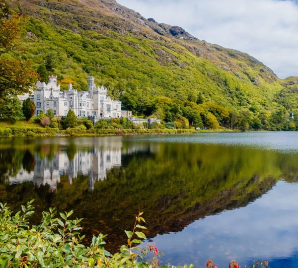 The incredible Kylemore Abbey and lake, included in our 2-day Connemara Lakes and Galway City private chauffeur tour.